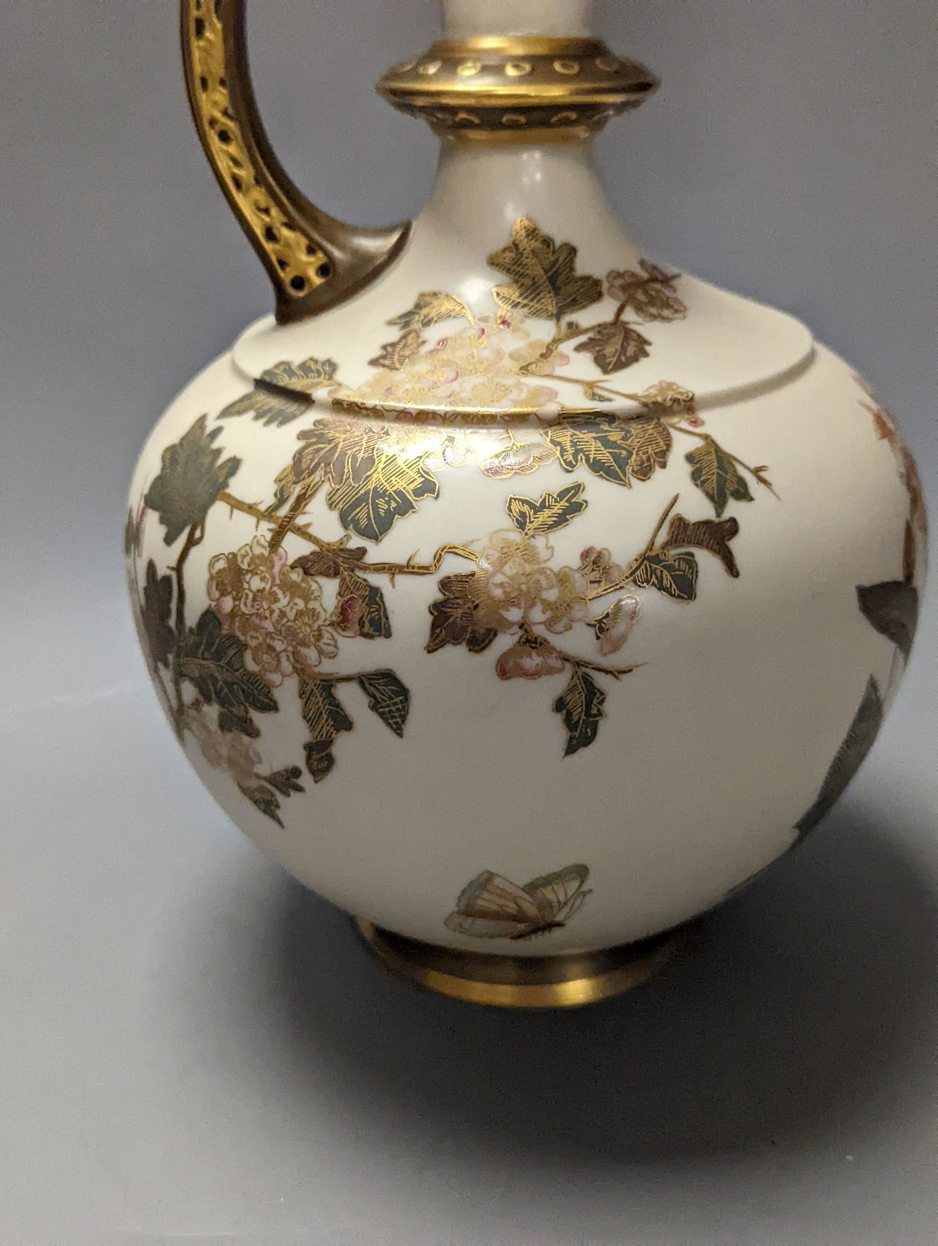 A Royal Worcester blush Ivory gilded floral ewer and a similar two handled vase 39cm